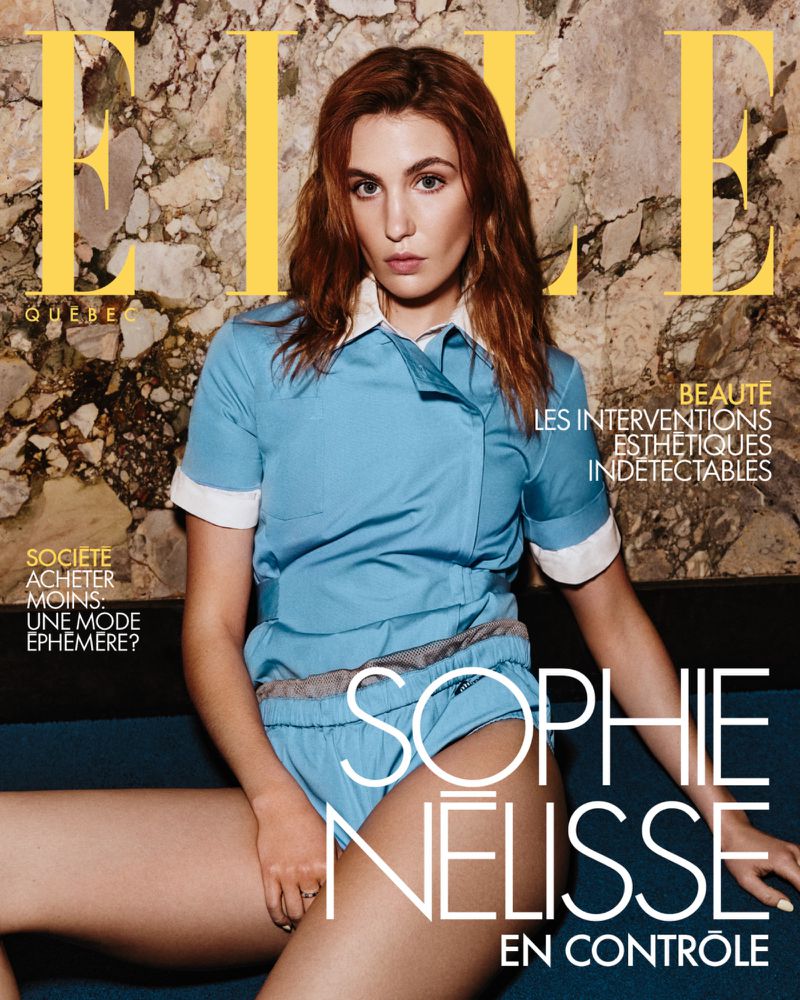 Elle Quebec magazine cover featuring Sophie Nelisse in a blue outfit against a marble background, showcasing fashion and beauty.