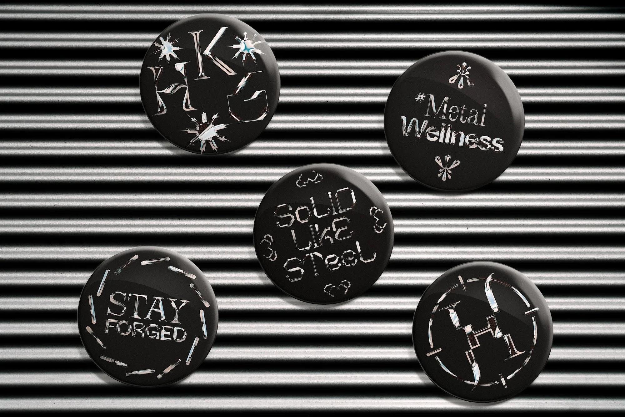 Five black pinback buttons with white metallic stylized text designs are displayed against a black and gray corrugated metal backdrop.