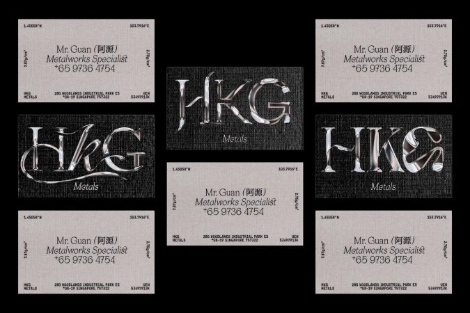 Business cards with metallic letter logos, featuring company name, contact details, and address against neutral and dark textured backgrounds.