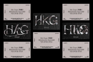 Business card designs for HKG Metals featuring metallic embossed lettering and textured cardstock