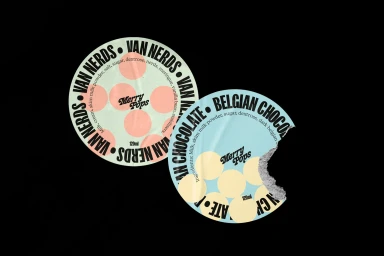Two round ice cream lids with polka dot patterns and bold typography on a black background.