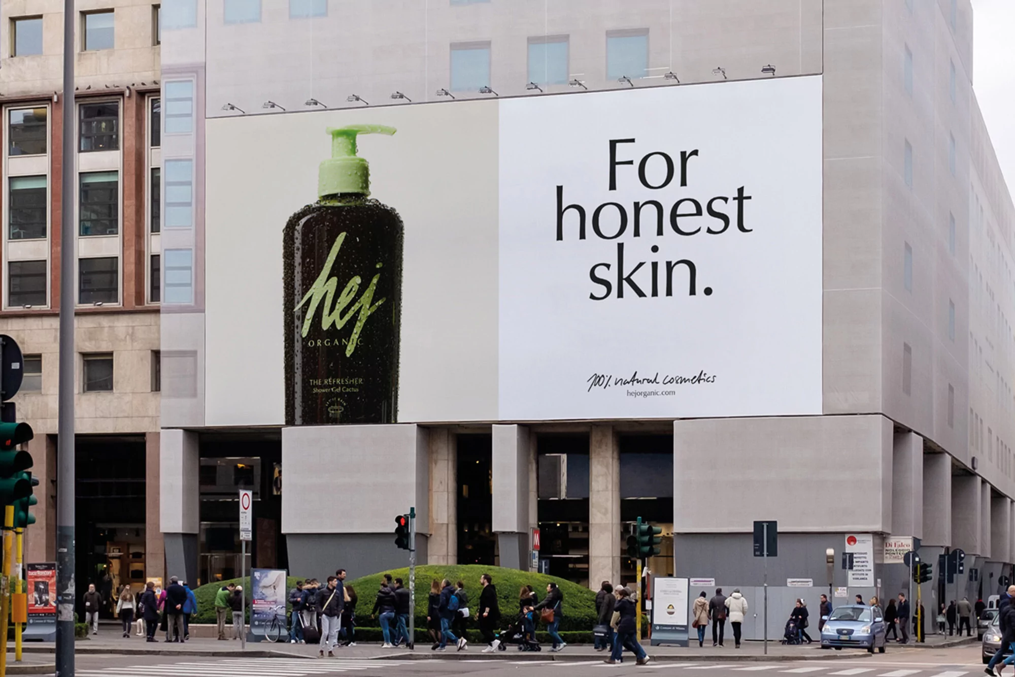 Urban scene with a large cosmetic product advertisement on a building, pedestrians crossing the street, and modern architecture.