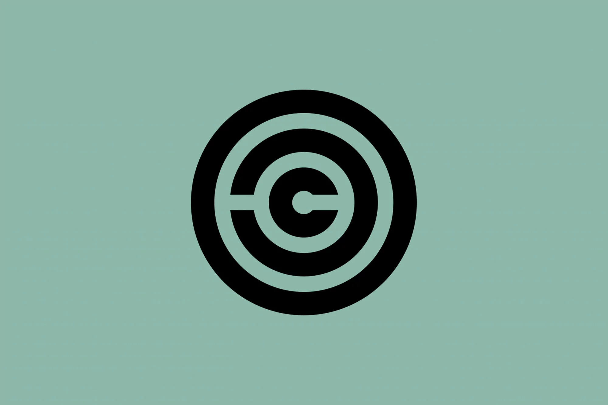 Minimalist black concentric circle logo design on a light green background, featuring a central letter 'C'.