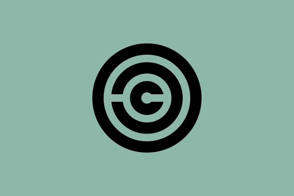 Minimalist black concentric circle logo design on a light green background, featuring a central letter 'C'.