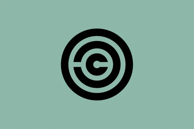 Minimalist black concentric circle logo design on a light green background, featuring a central letter 'C'.