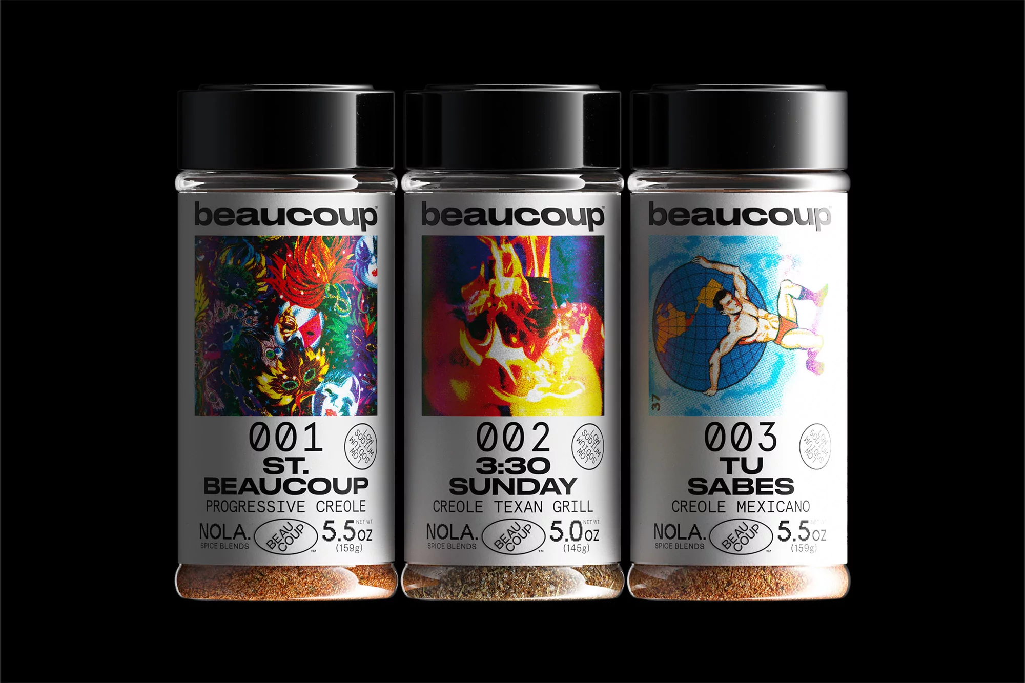 Three spice blends from Beaucoup displayed against a black background, featuring unique label art and visible spice contents.