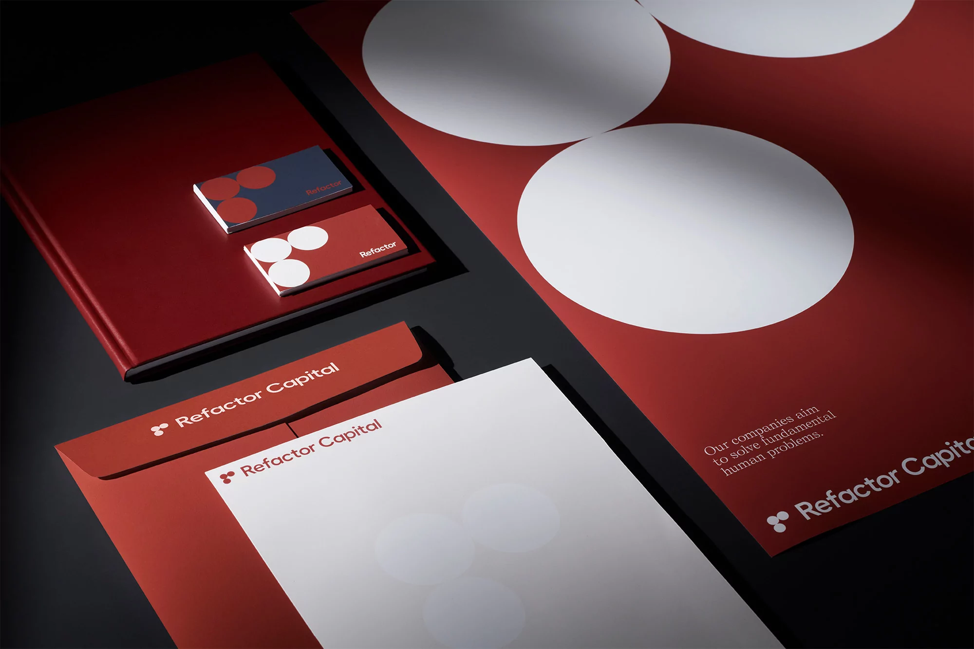 Promotional material for Refactor Capital featuring a folder, business cards, letterhead, and presentation sheet, all with matching design.