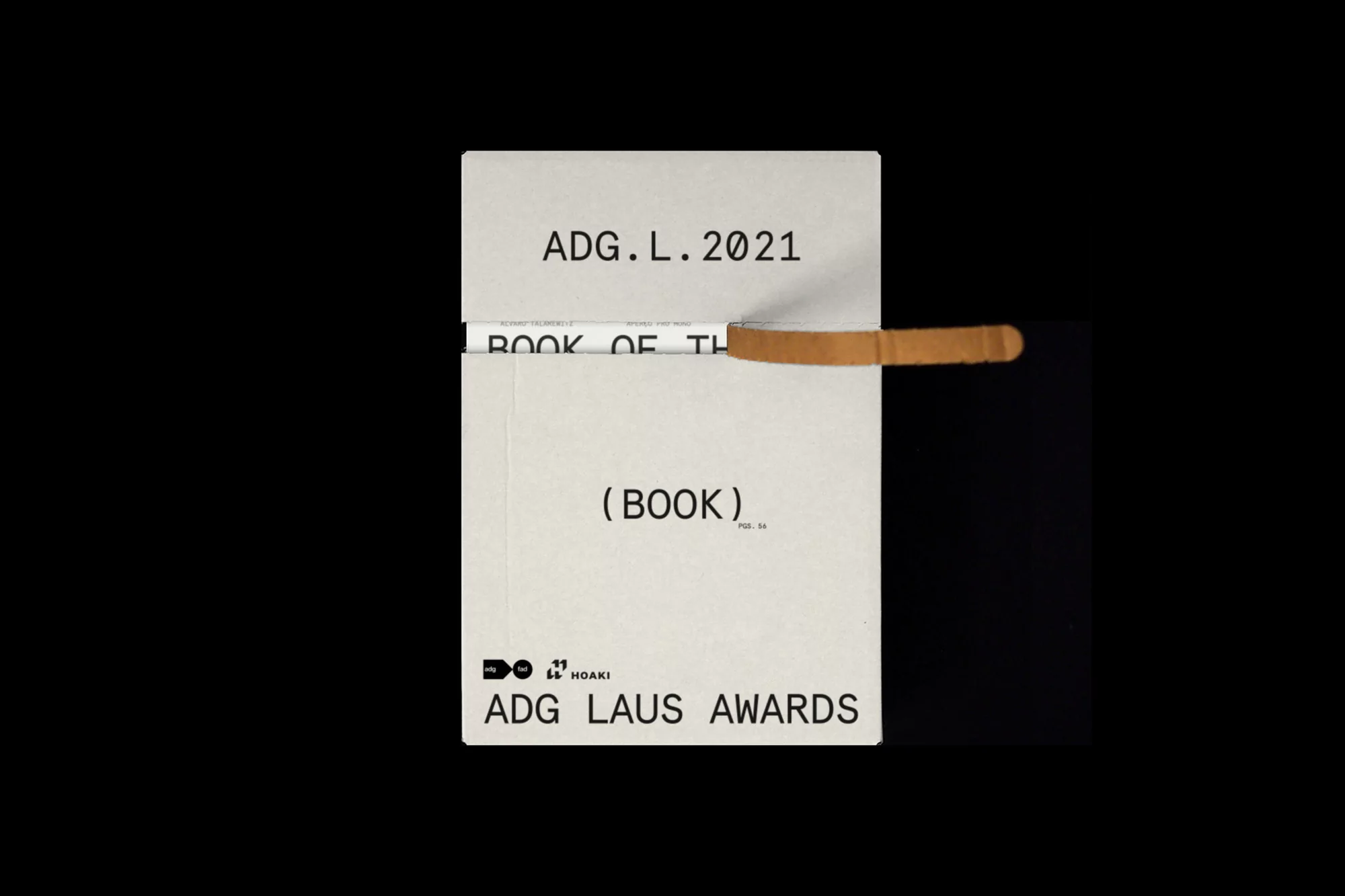 Book cover design features the ADG Laus Awards 2021 title. The cover is white with simple, bold typography, accented by a brown paper detail.