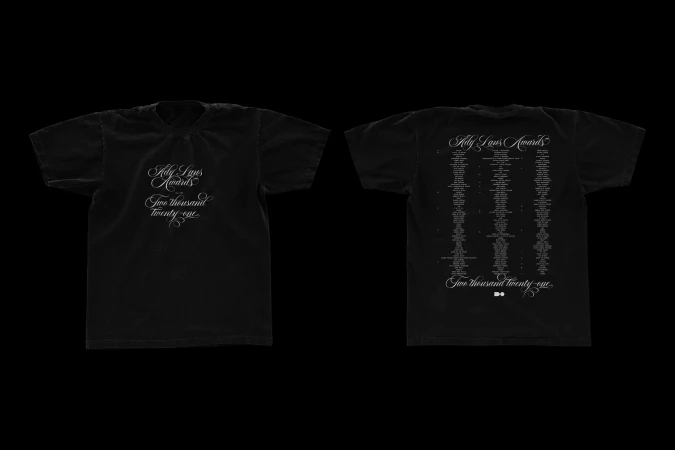 Two black t-shirts displaying graphic art and text for 'Ady Laws Awards, Two Thousand Twenty-One' against a dark background.