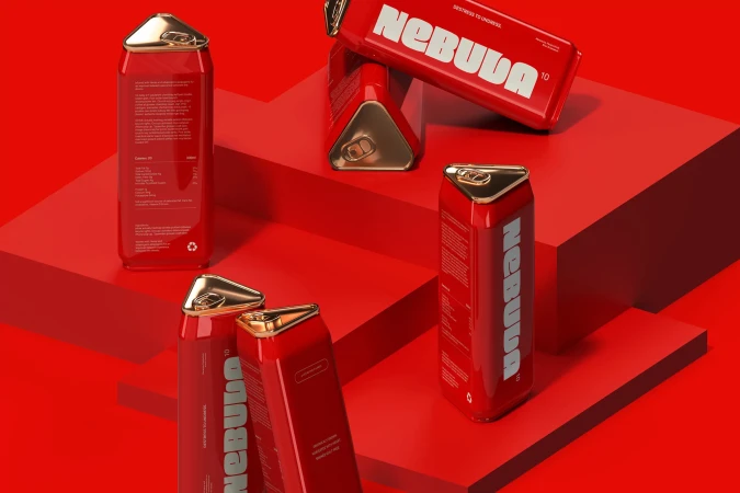 Arrangement of red Nebula drink cans with gold accents on a red cube platform, studio lighting, and commercial product photography style.