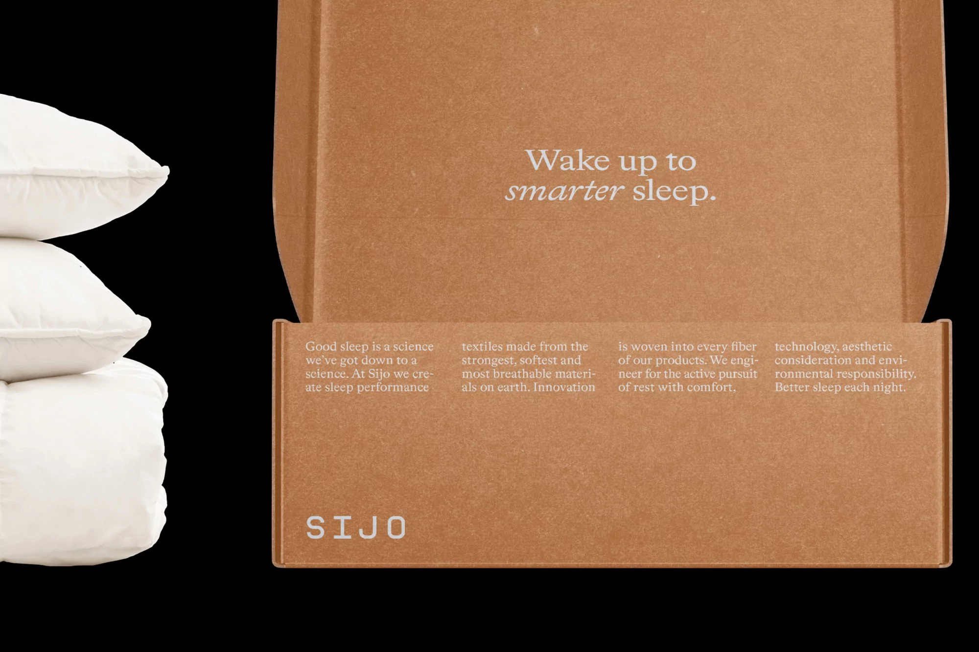 Stack of soft white pillows beside an open cardboard box with sleep-related text; focus on comfort and quality sleep.