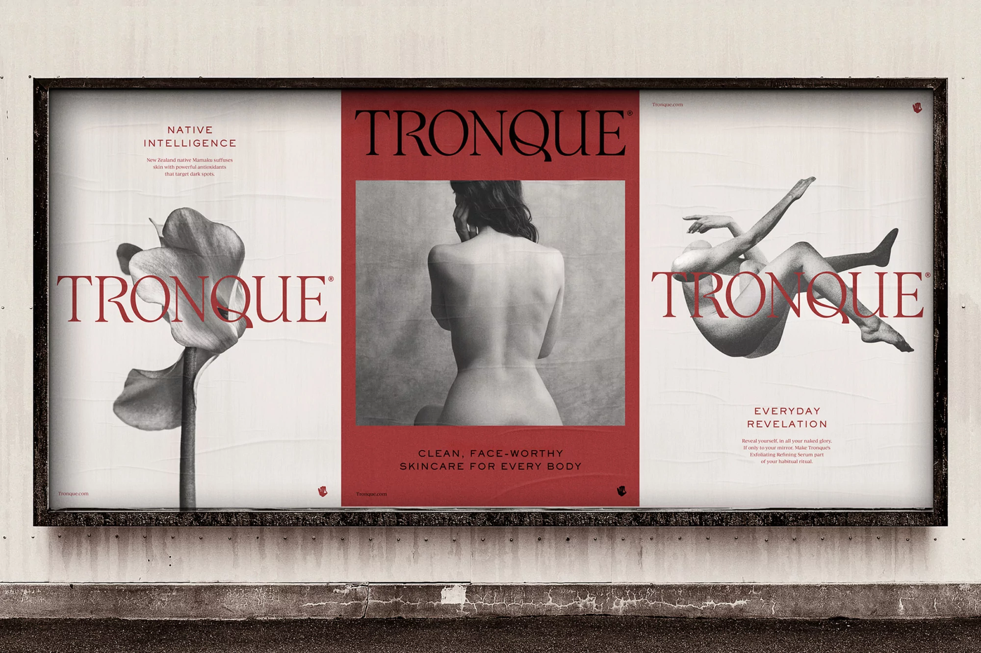 Outdoor billboard advertisement features a flower, a nude woman's back, and a reclining woman for the skincare brand TRONQUE.