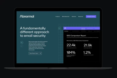 Laptop displaying a dark teal and purple website interface for Abnormal email security brand identity design