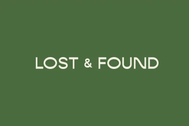 Lost & Found brand identity design featuring white sans-serif typography centered on a solid green background.