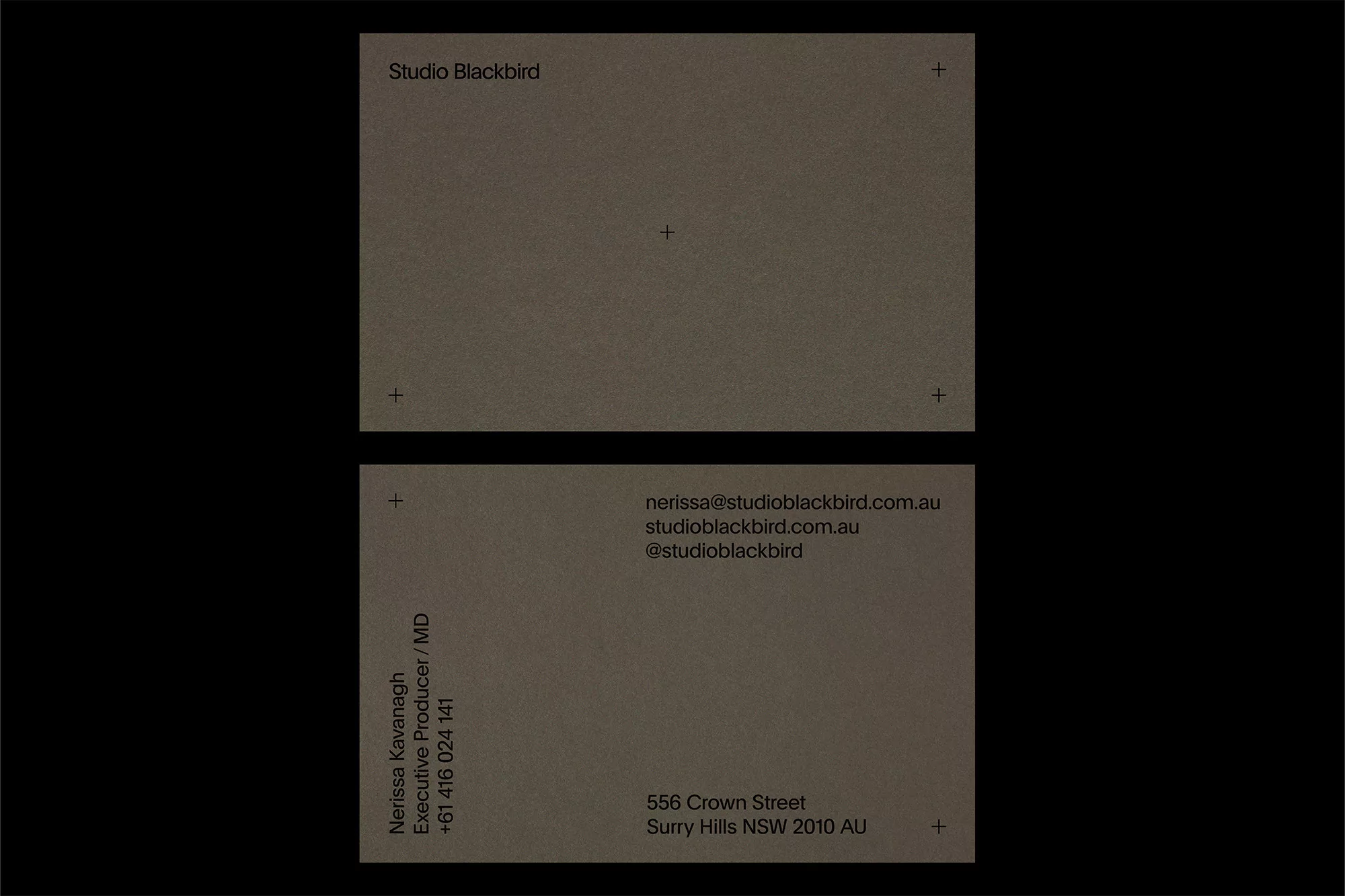 Studio Blackbird business cards featuring contact information for Nerissa Kavanagh, Executive Producer, on a gray textured surface.