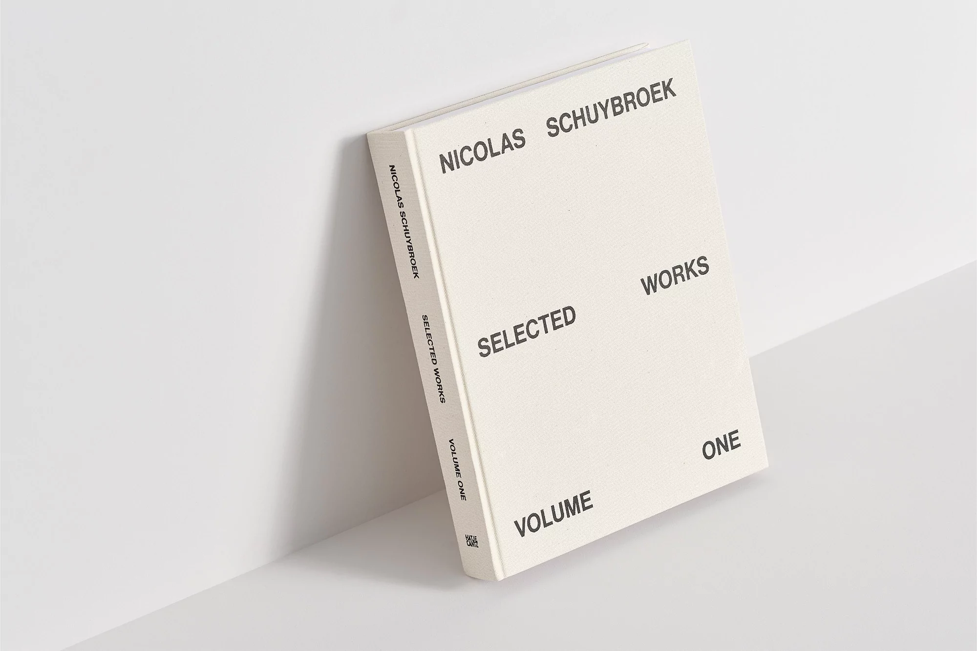 Hardcover book by Nicolas Schuybroek, titled 'Selected Works Volume One', is displayed on a white surface against a white background.