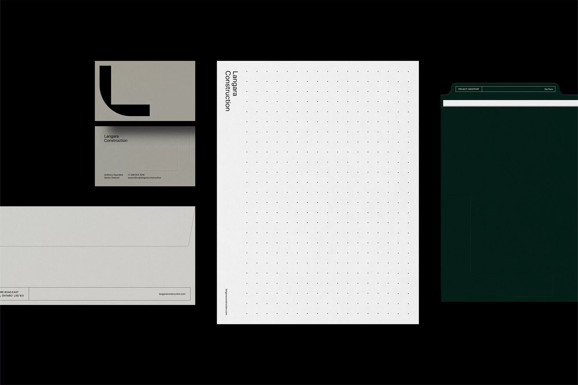Langara Construction company stationery with business card, letterhead, envelope, and folder in neutral tones against a stark black backdrop.