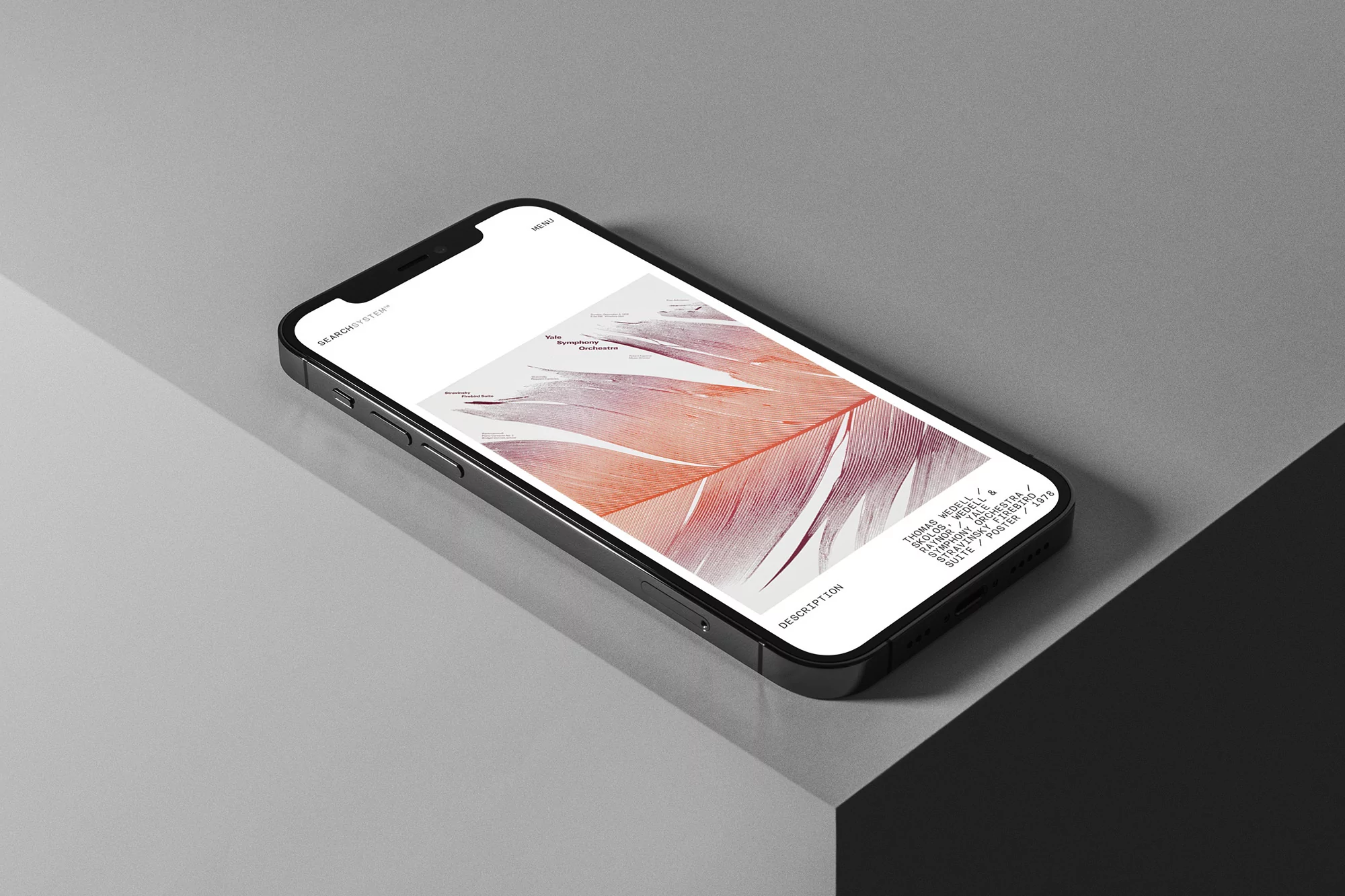 Black smartphone displays linear abstract art on a gray surface, set against a contrasting geometric backdrop. Close-up shot.