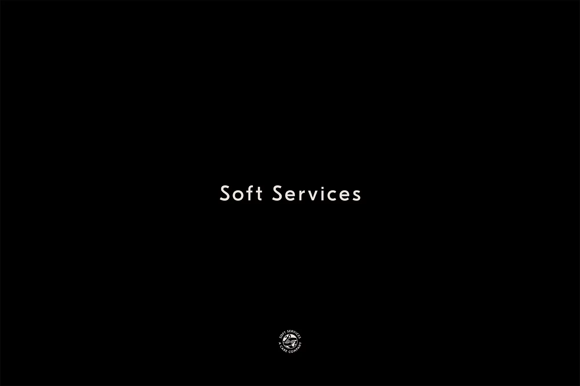 A black background features the white text “Soft Services” at the center, above a small logo at the bottom, creating a minimalist design.