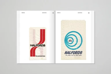 Open book spread showing brand identity design with vintage Halfords logos on textured paper bags.