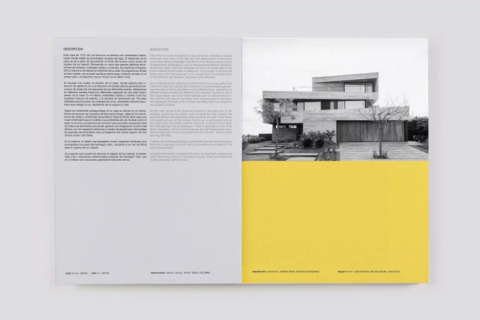 Architectural photography of a modern house with a flat roof and concrete exterior, a printed architectural magazine article is shown.