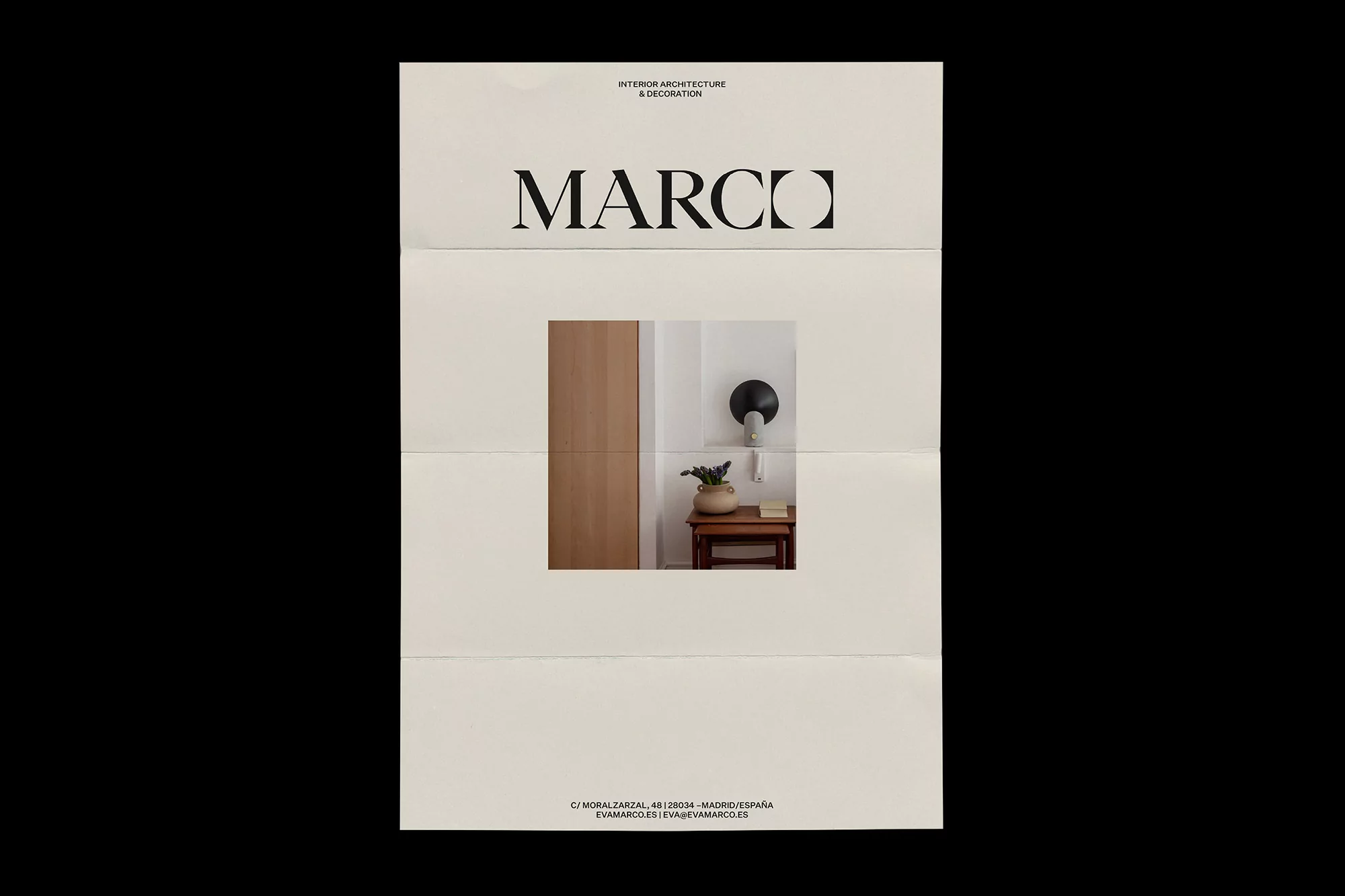 Promotional poster with interior decor image, including a lamp, plants, small table, and wood door; off-white background with black text.
