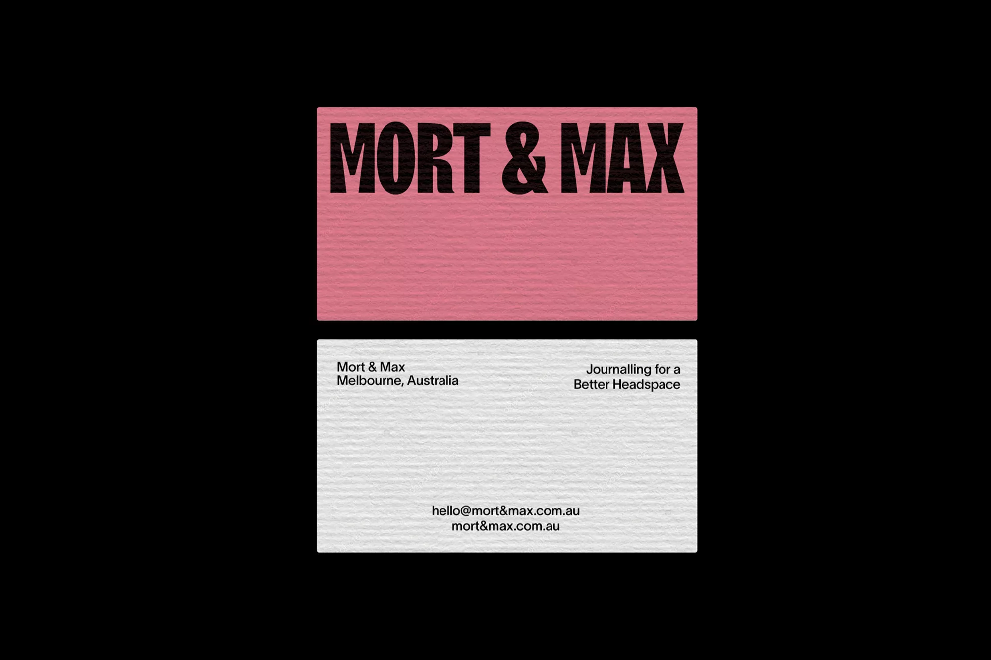 Promotional business card featuring a pink header with "Mort & Max" printed above their contact information and slogan.