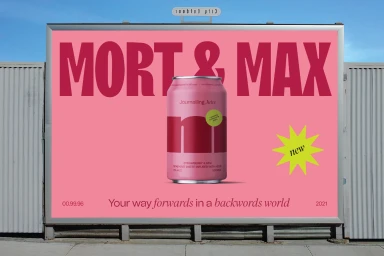 Large outdoor advertising billboard featuring a pink beverage can for Mort & Max against a pink background with bold red typography