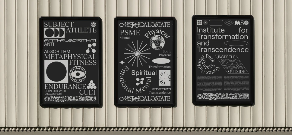 Three black-framed posters with white text on a white wall. The posters have various designs and words, creating a visually intriguing display.