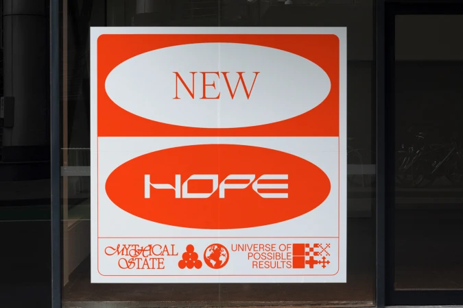 Promotional poster on glass door featuring 'New Hope' in vibrant orange, alongside company logos and geometric design elements.