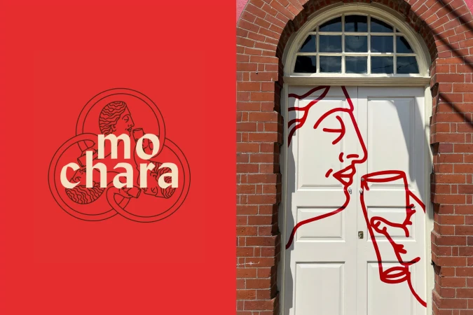 Line art graphic on a door features a person drinking from a glass. A logo for 'mo chara' is on a red background.