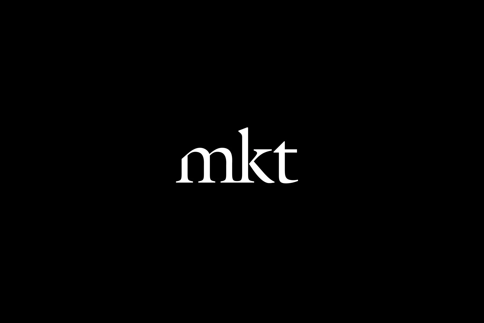 Minimalist image of the lowercase text 'mkt' in white against a solid black background, highlighting a simple wordmark.
