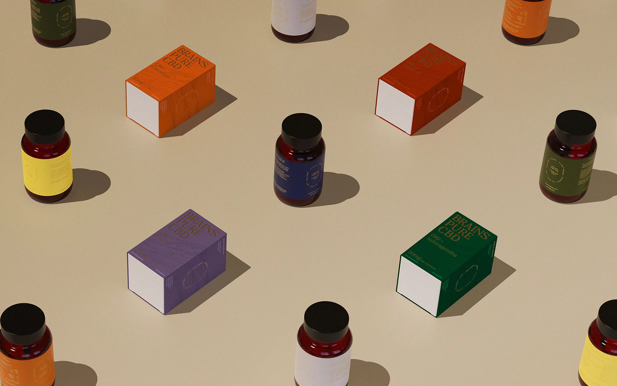 Overhead shot of assorted colorful Brains Pure CBD product boxes and bottles arranged on a beige surface, creating a vibrant pattern.