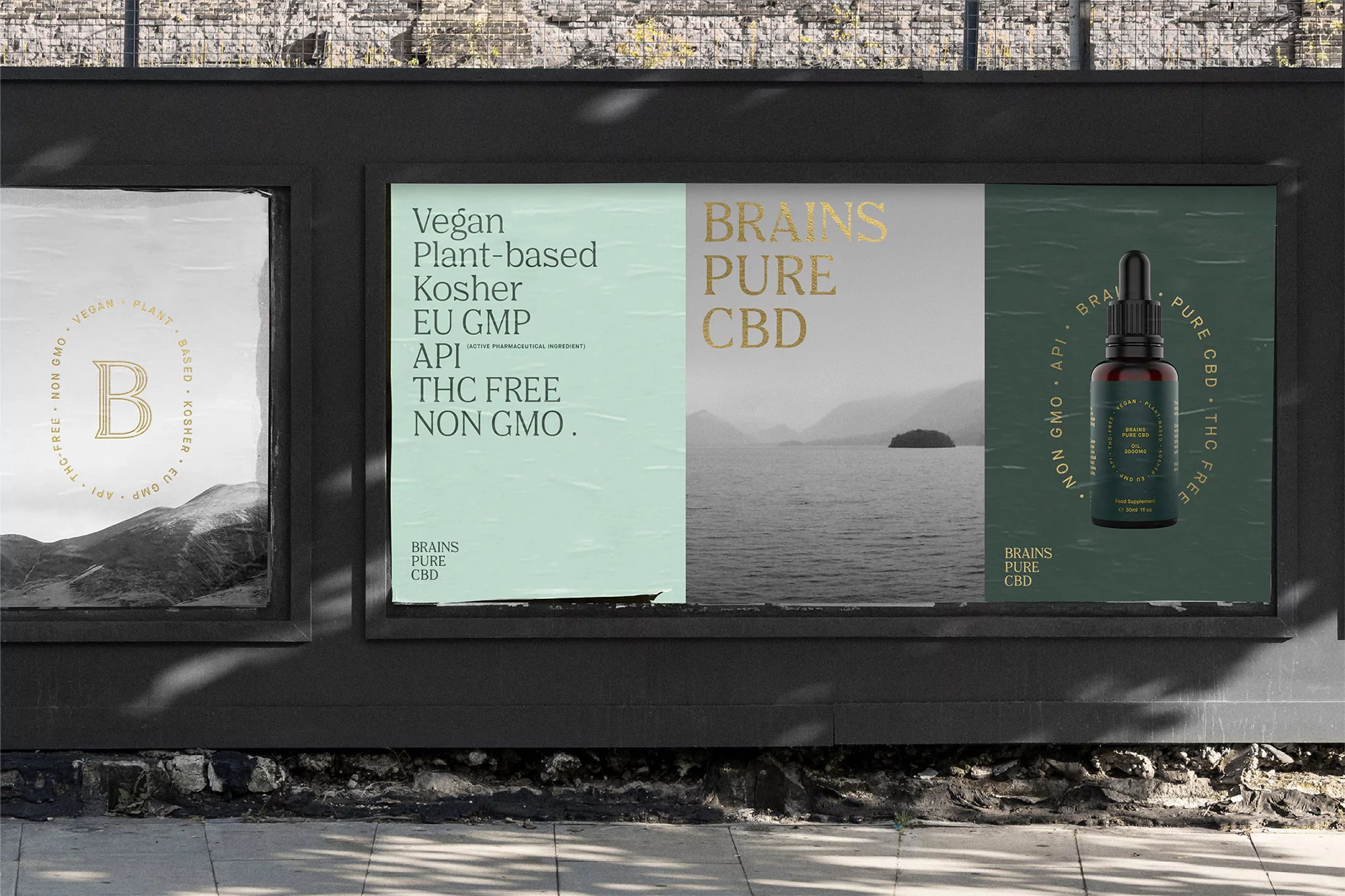 Eye-level outdoor view of a billboard featuring Brains Pure CBD product advertisements, set against an urban backdrop with stone sidewalk.