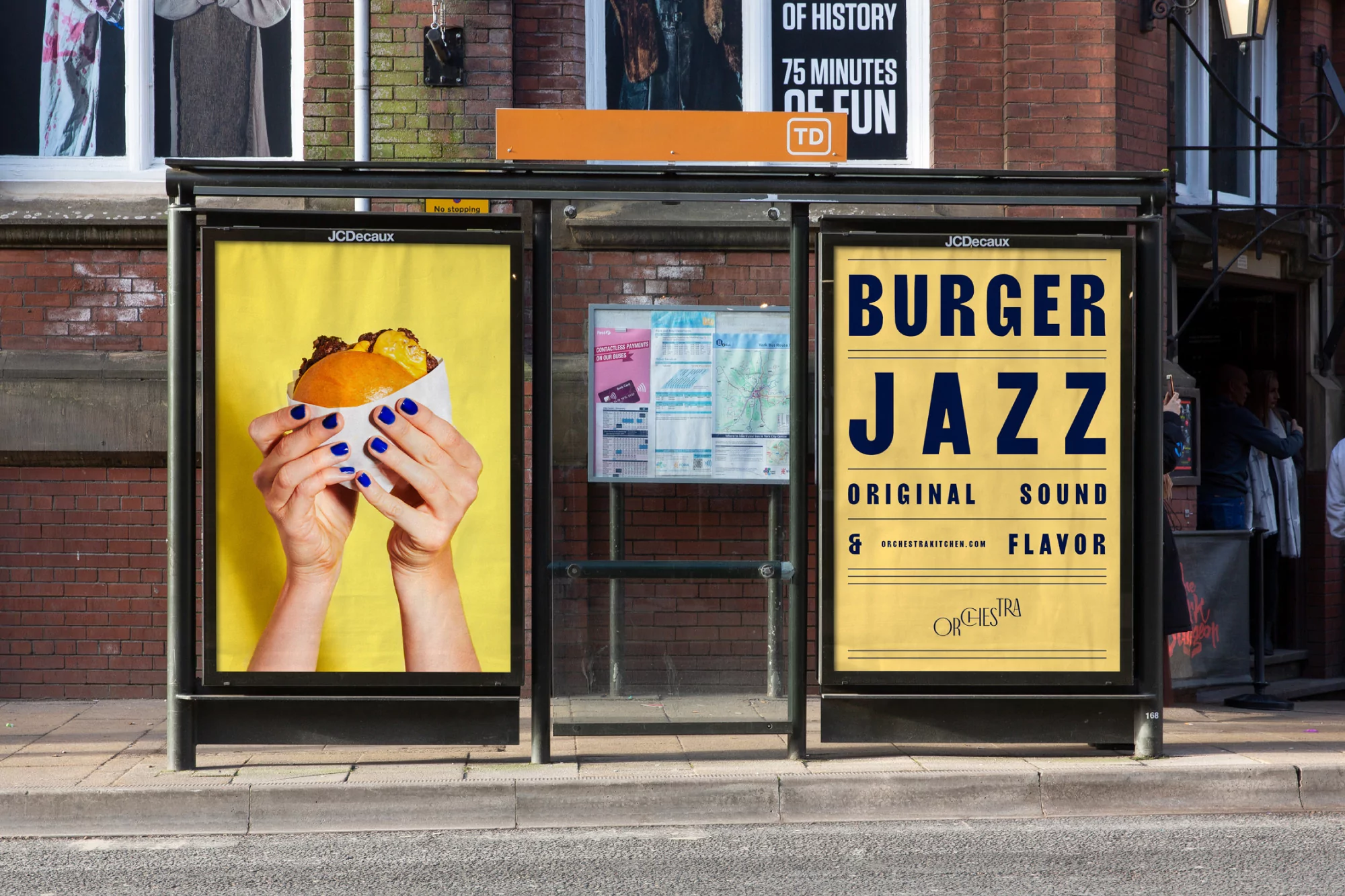 Bus stop advertising a burger and jazz event, with hands holding a burger on a bright yellow background for the advertisement.