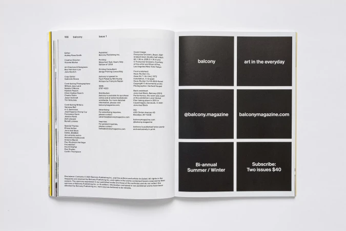 Opened pages of Balcony magazine featuring a black and white design, with text blocks and magazine information on a white background.