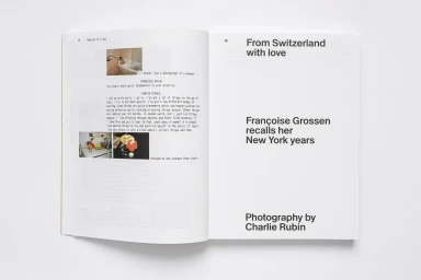 Open book spread featuring editorial text, photography credits, and small images on white paper against a neutral surface