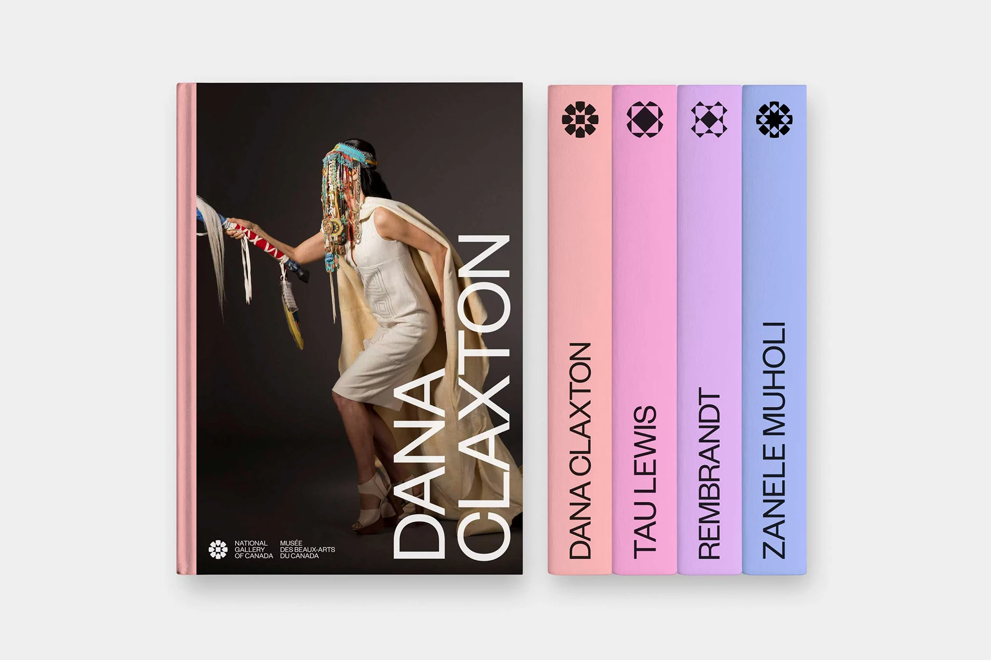 Book cover featuring Dana Claxton in traditional dress, alongside book spines of Dana Claxton, Tau Lewis, Rembrandt, and Zanele Muholi.