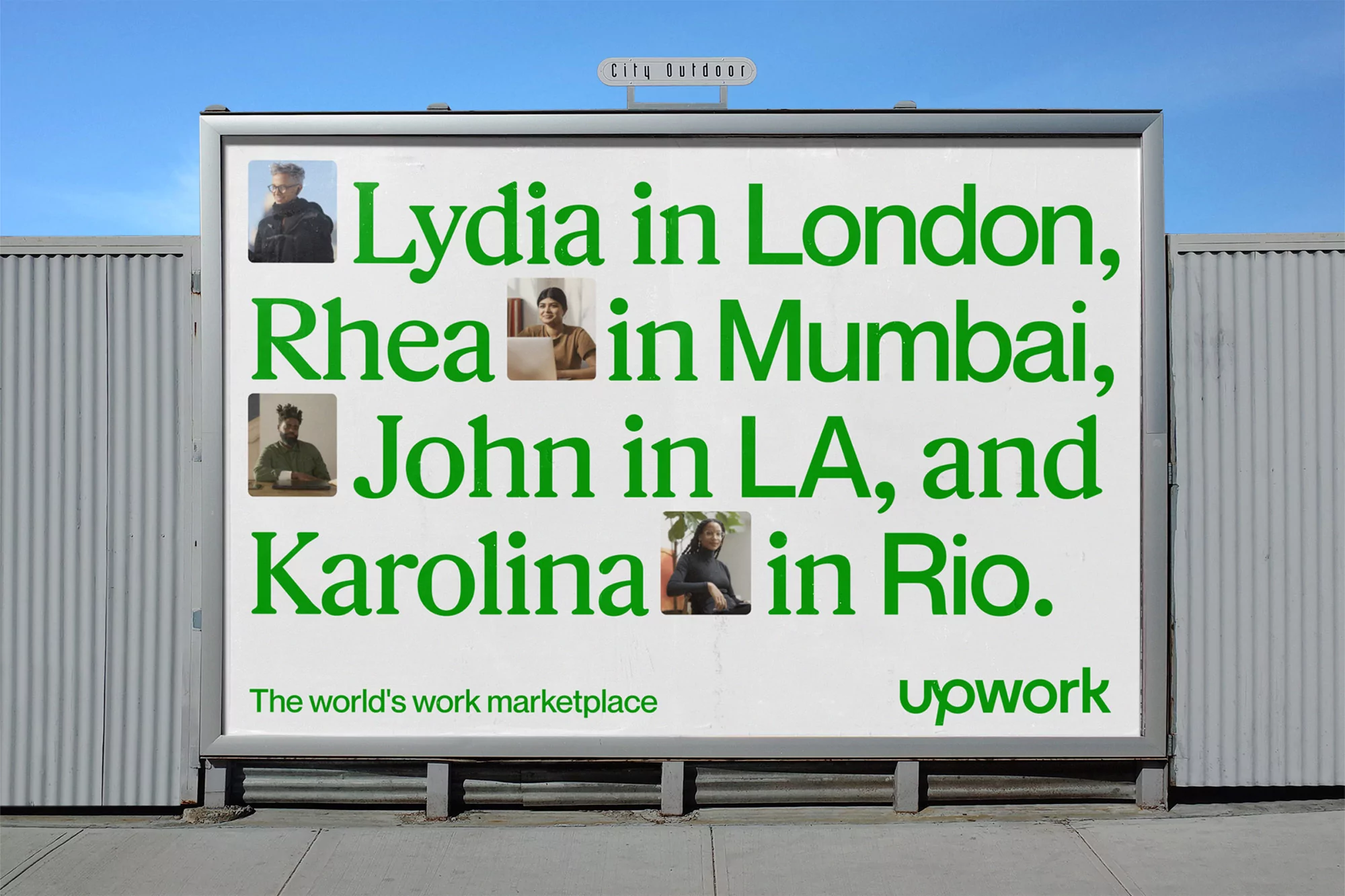 Outdoor billboard featuring images of individuals named Lydia, Rhea, John, and Karolina with Upwork logo against a blue sky.