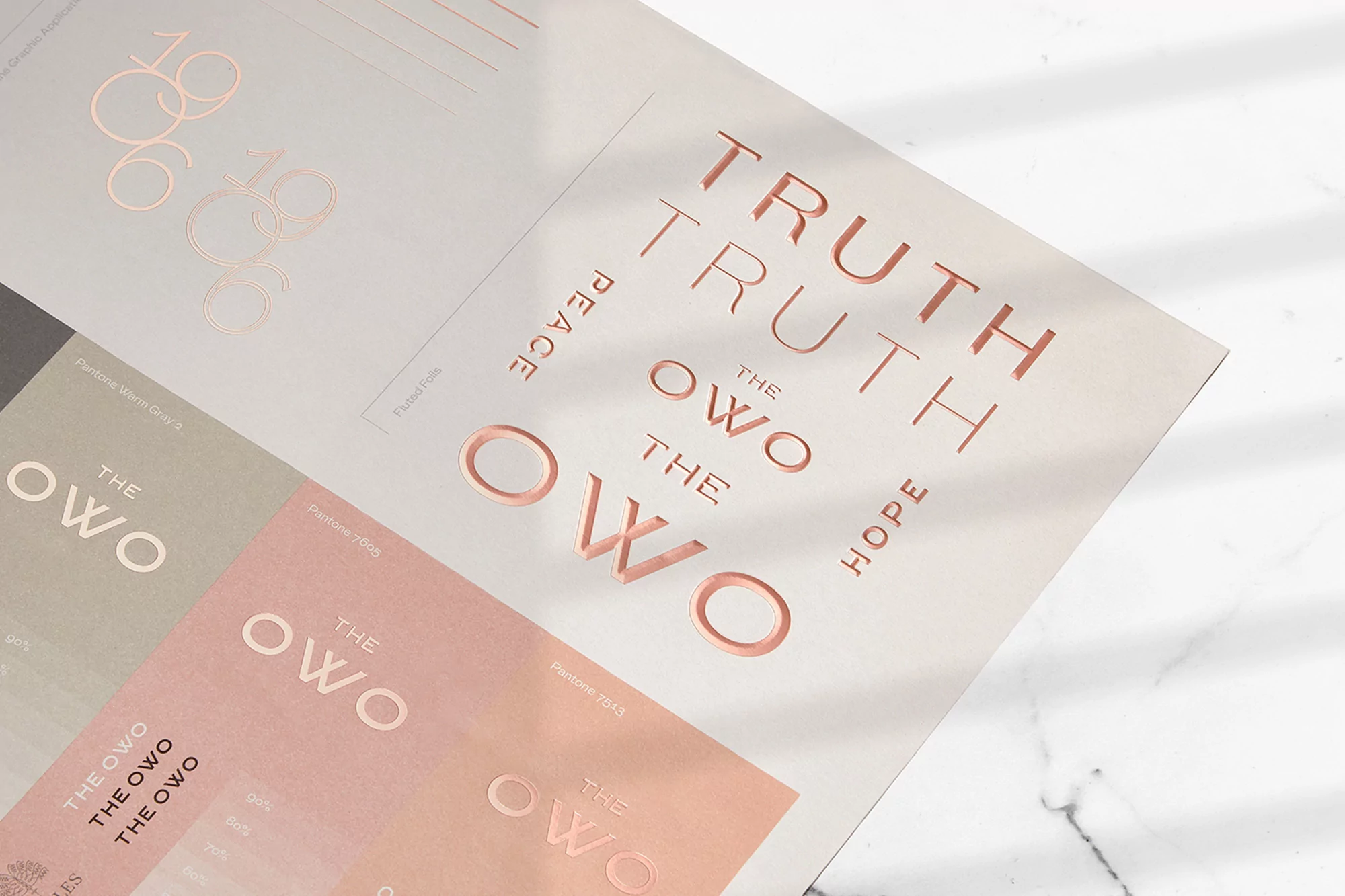 Graphic design featuring rose gold lettering on a light background, showcasing typography and Pantone color swatches with a clean aesthetic.