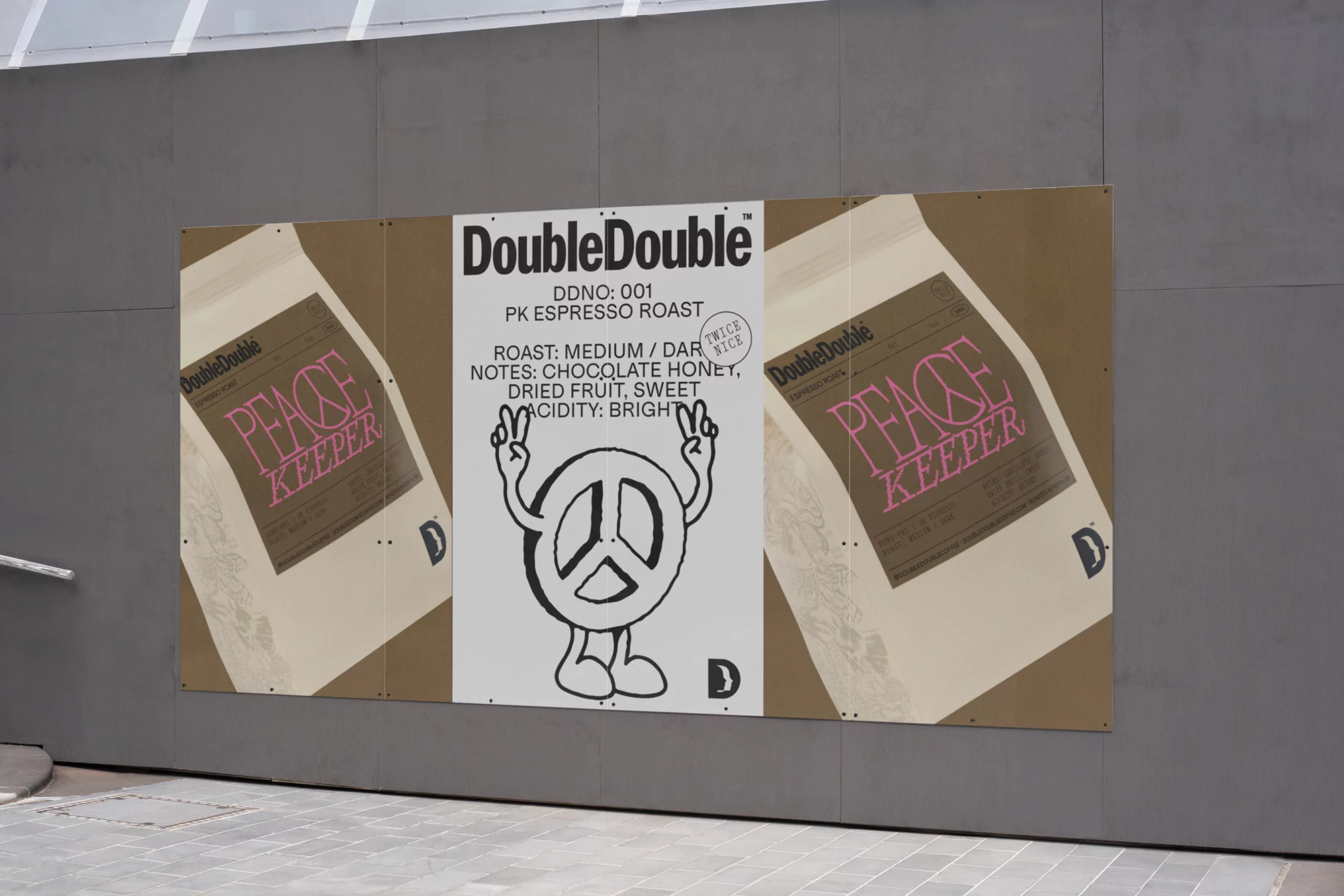 Outdoor advertising billboard featuring Double Double coffee brand with bag of coffee beans graphic and peace symbol graphic.