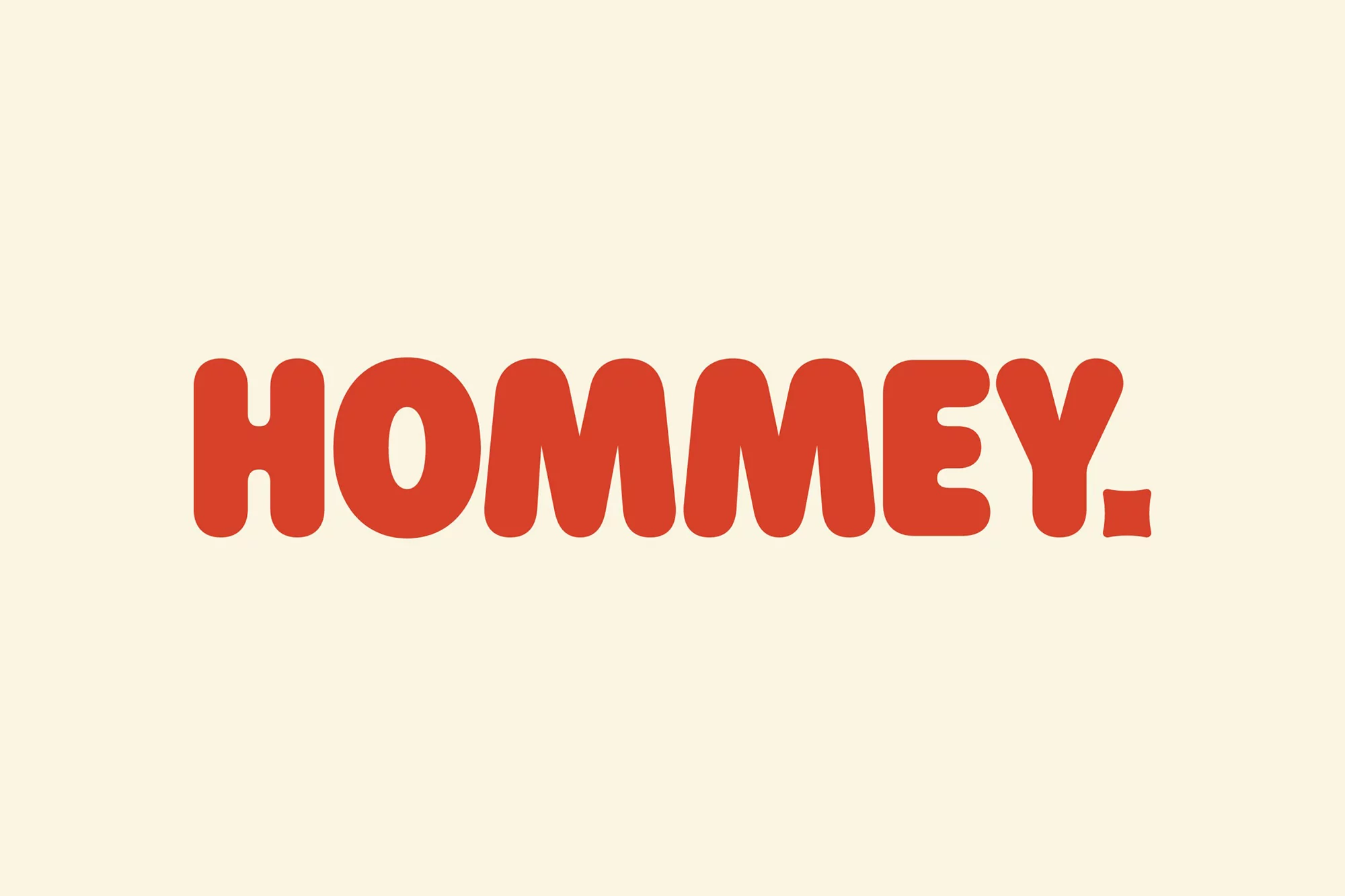 Hommey brand logo in bold red rounded typography centered on a light cream background