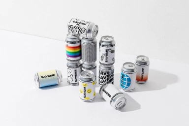 Stacked and scattered SAVEME beverage cans with diverse graphic designs on a white seamless background.