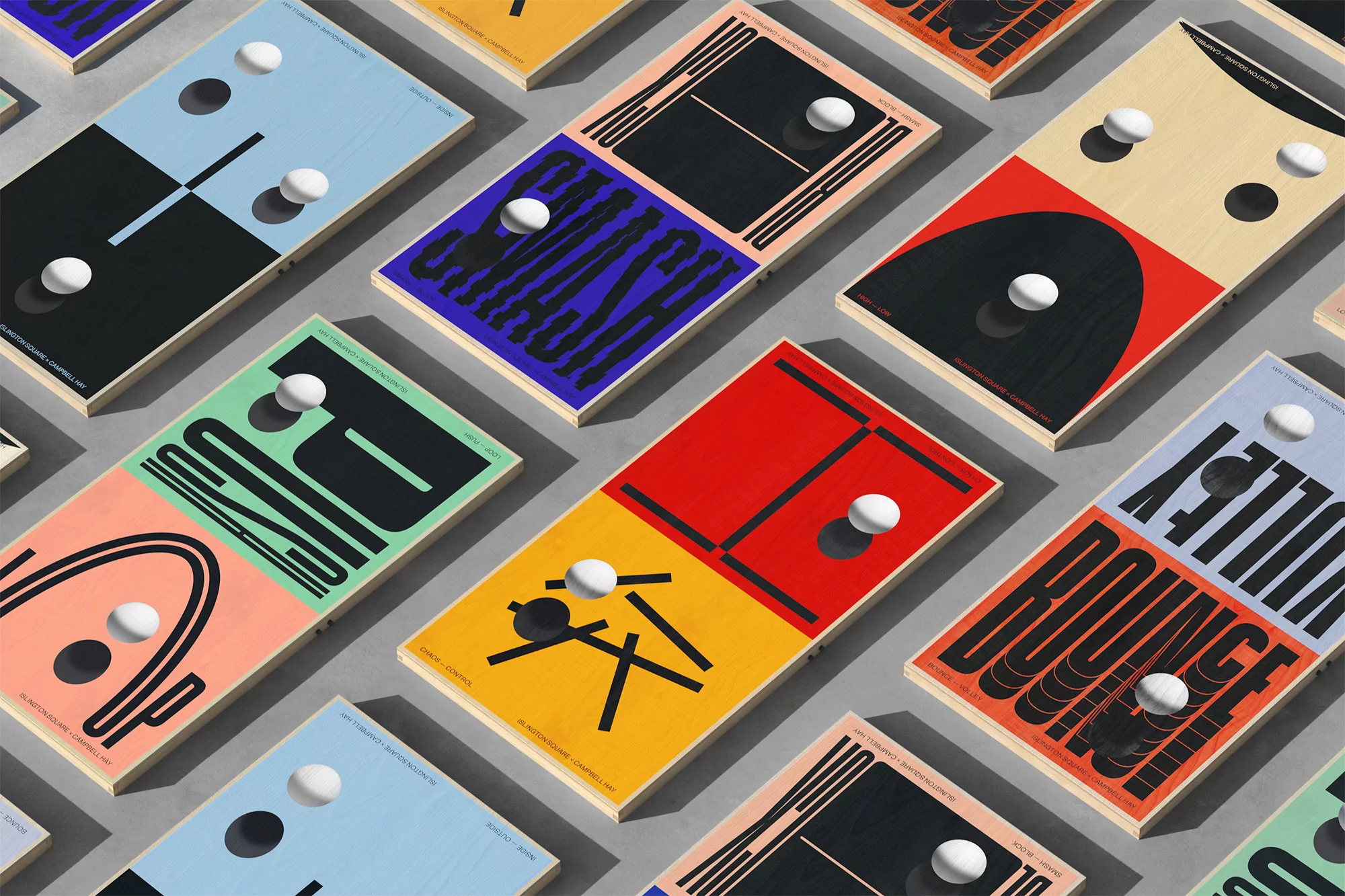 Overhead shot of artfully arranged ping pong paddles and balls, showcasing a colorful and dynamic tabletop composition.