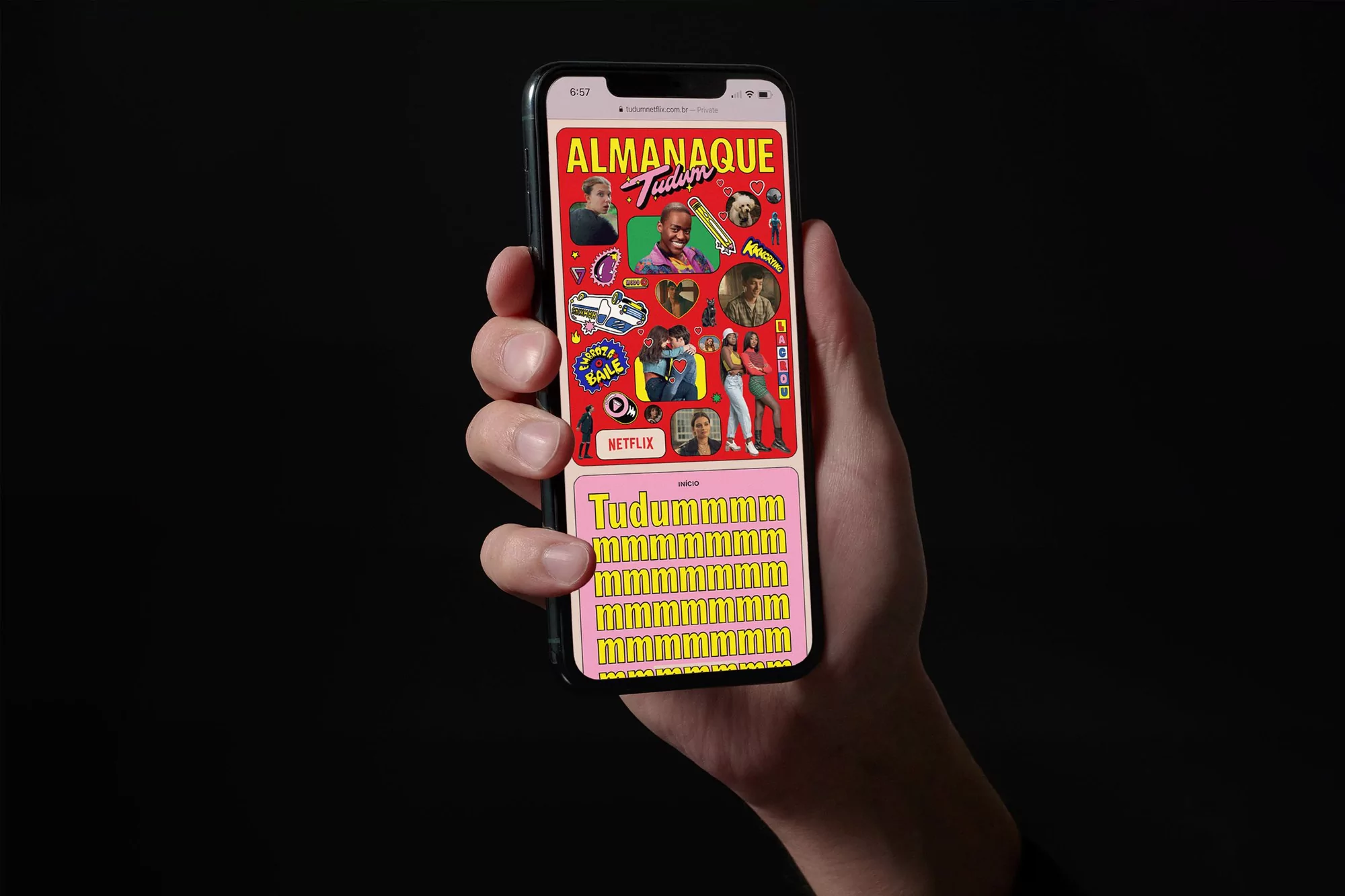 Hand holding a smartphone displaying a vibrant digital collage with a red background, featuring Netflix's 'Tudum' branding and diverse pop culture images.