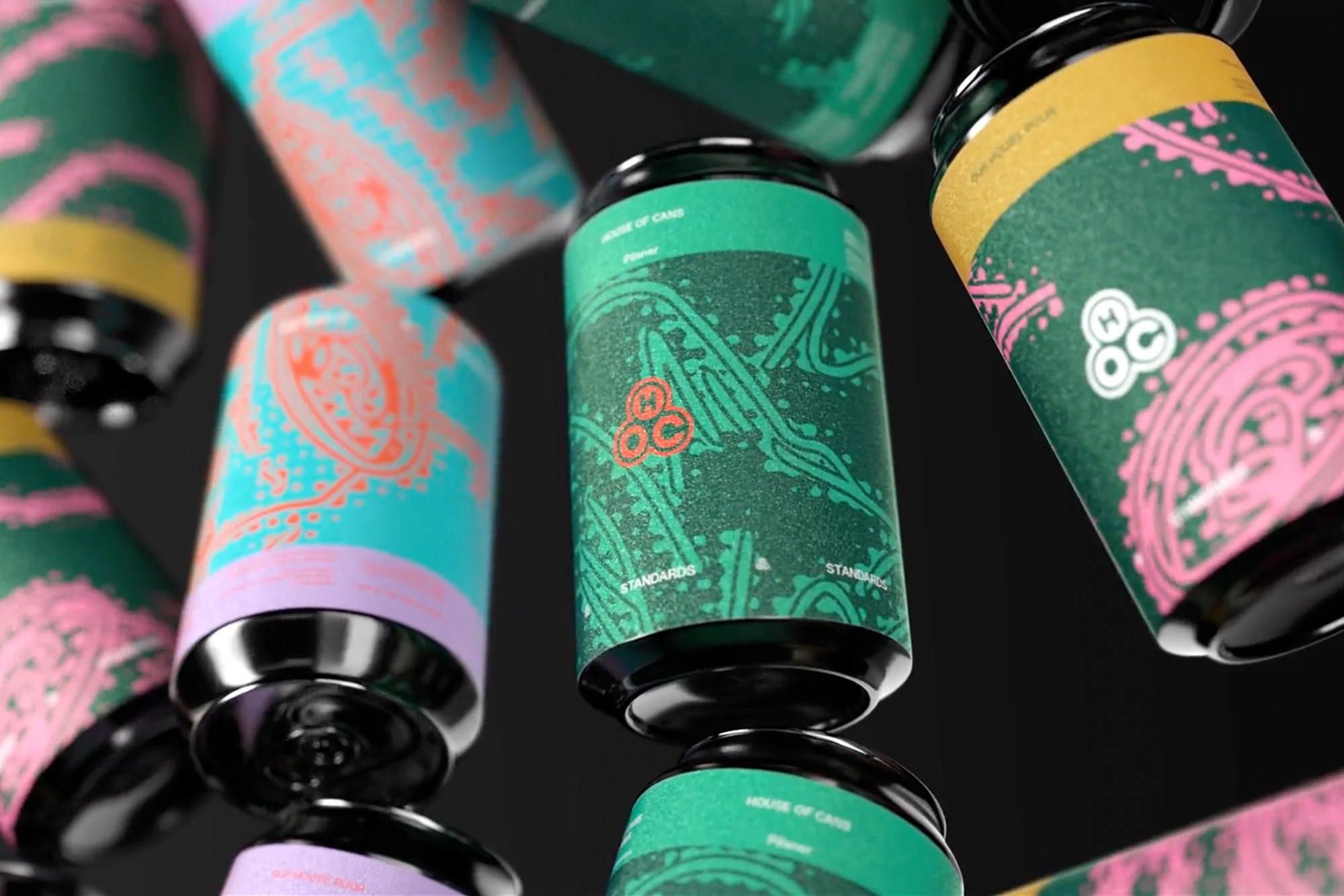 Multiple colorful cans with unique designs and dark lids on a dark background, creating a visually appealing and modern product display.