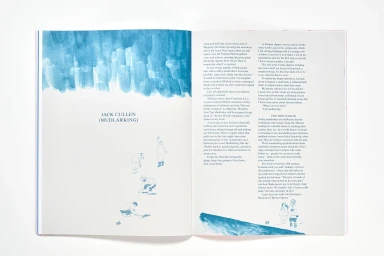 Open book spread showing blue ink illustrations, headings, and columns of text on white pages