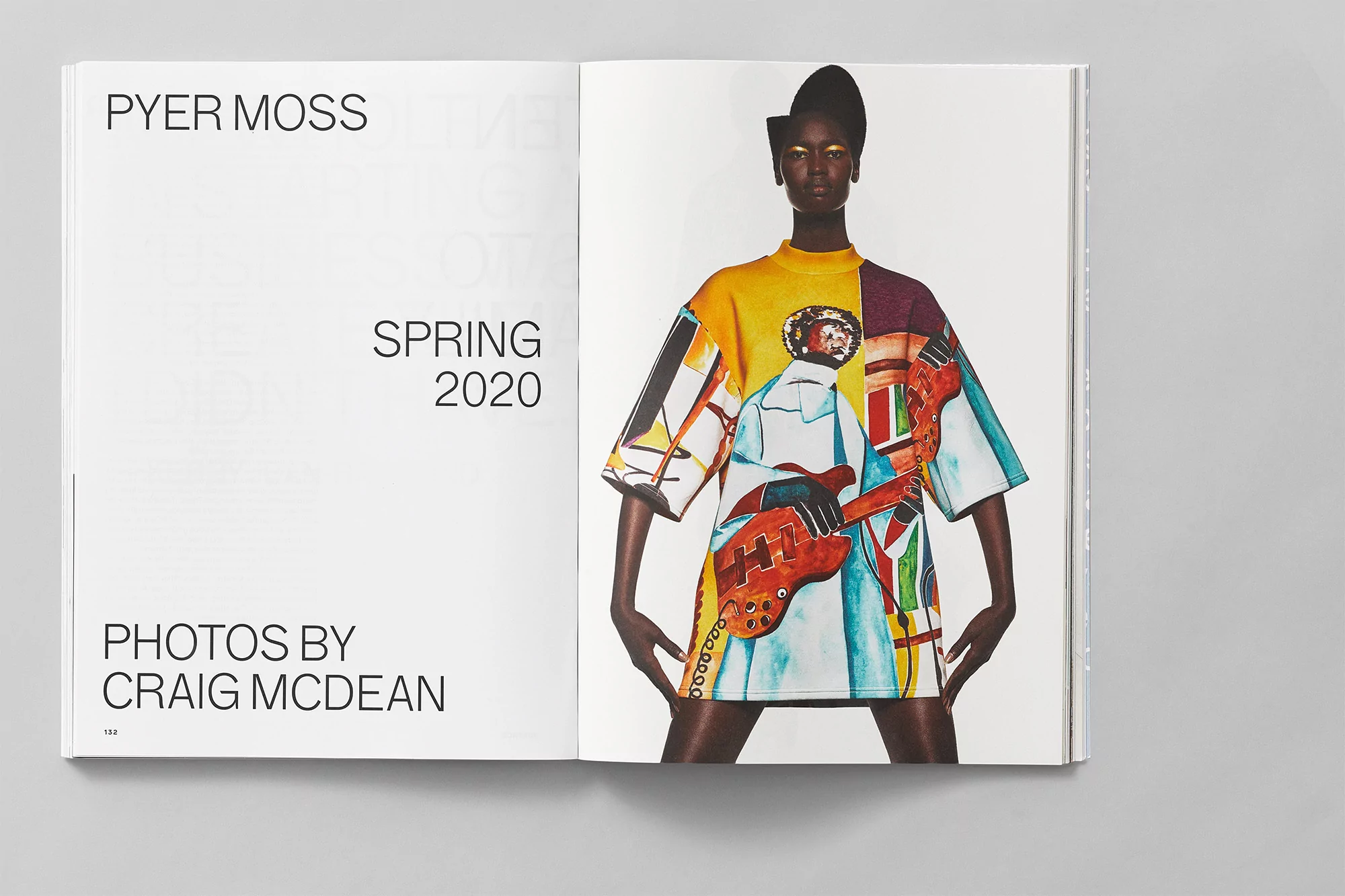 Fashion editorial from Pyer Moss Spring 2020 featuring a Black female model in an artistic colorful printed outfit against a white backdrop.