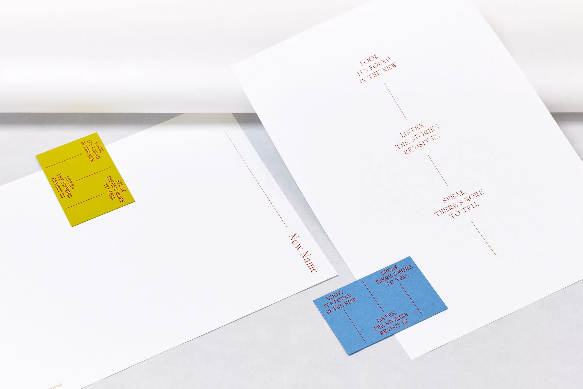 Conceptual image with white paper and colorful cards featuring text that says, 'Look. It's found in the new. Listen. The stories revisit us. Speak. There's more to tell'.