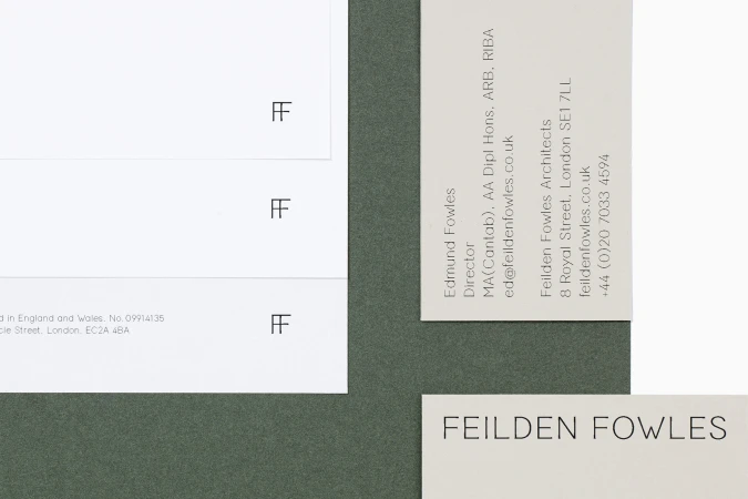 Close-up of Feilden Fowles Architects stationery, including letterhead and business cards, in a minimalist style with an olive green background.